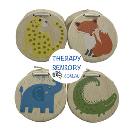 Wooden Animal Castanet from TherapySensory.com.au displays 4 castanets with an elephant, crocodile, fox and leopard painted on the top.