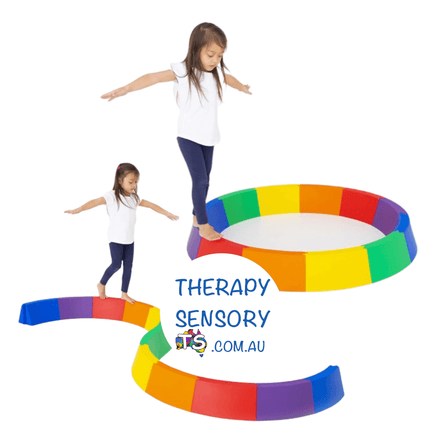 Balance Beam from Therapysensory.com.au shows a young girl walking on a sectional balance beam made up of plastic interlocking parts that can form a circle or S shape.