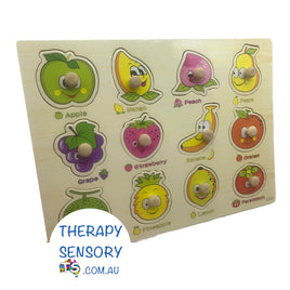 Fruit puzzle from TherapySensory.com.au displays a children's puzzle with 12 fruit pieces that you have to put in their respective fruit shaped holes.