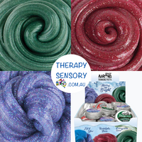 Crazy Aaron Christmas putty from TherapySensory.com.au showing three different coloured putty red, green, purple