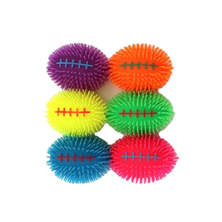Cushee Frizzee Footballs from TherapySensory.com.au. Great to squeeze and the rub over skin with little rubber spikes.