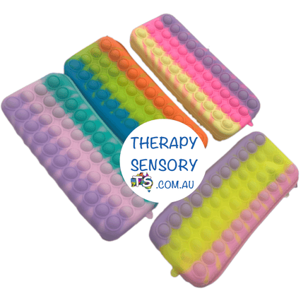 Bubble Push Pop Pencil Case from TherapySensory.com.au. Shows four pencil cases with bubble push pops on the outside that you can push in and out to help with fidgeting.