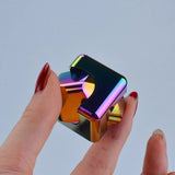 Metal Spinning Cube in  case.